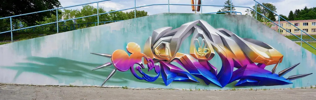 Farebné 3D graffiti na opornom múre